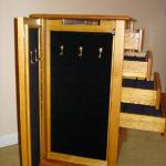Side view of jewelry chest with drawers open.